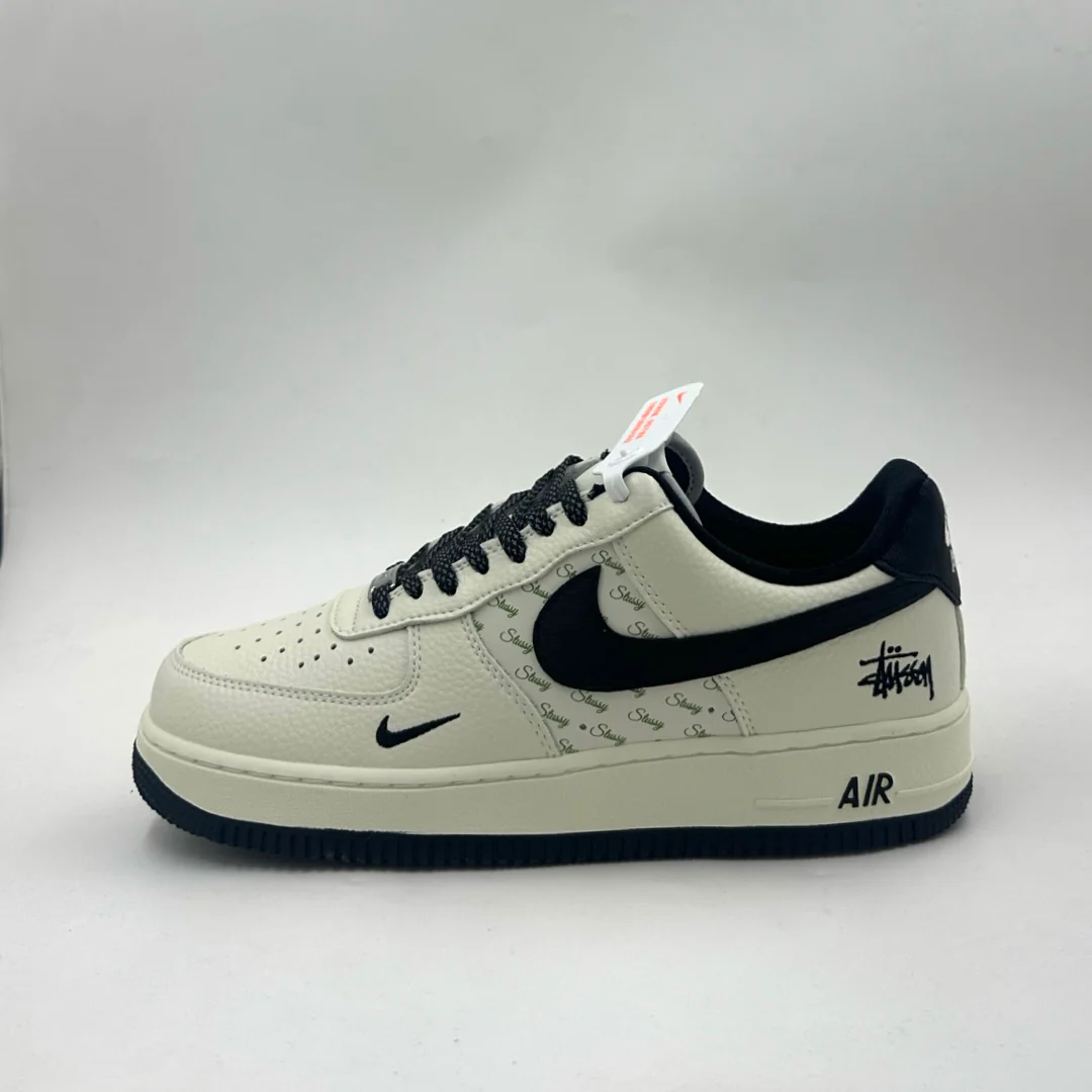 Nike Air Force 1 Low 07 x Stussy in a beige and black colorway